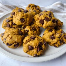 a plate of tahini pumpkin chocolate chip cookies