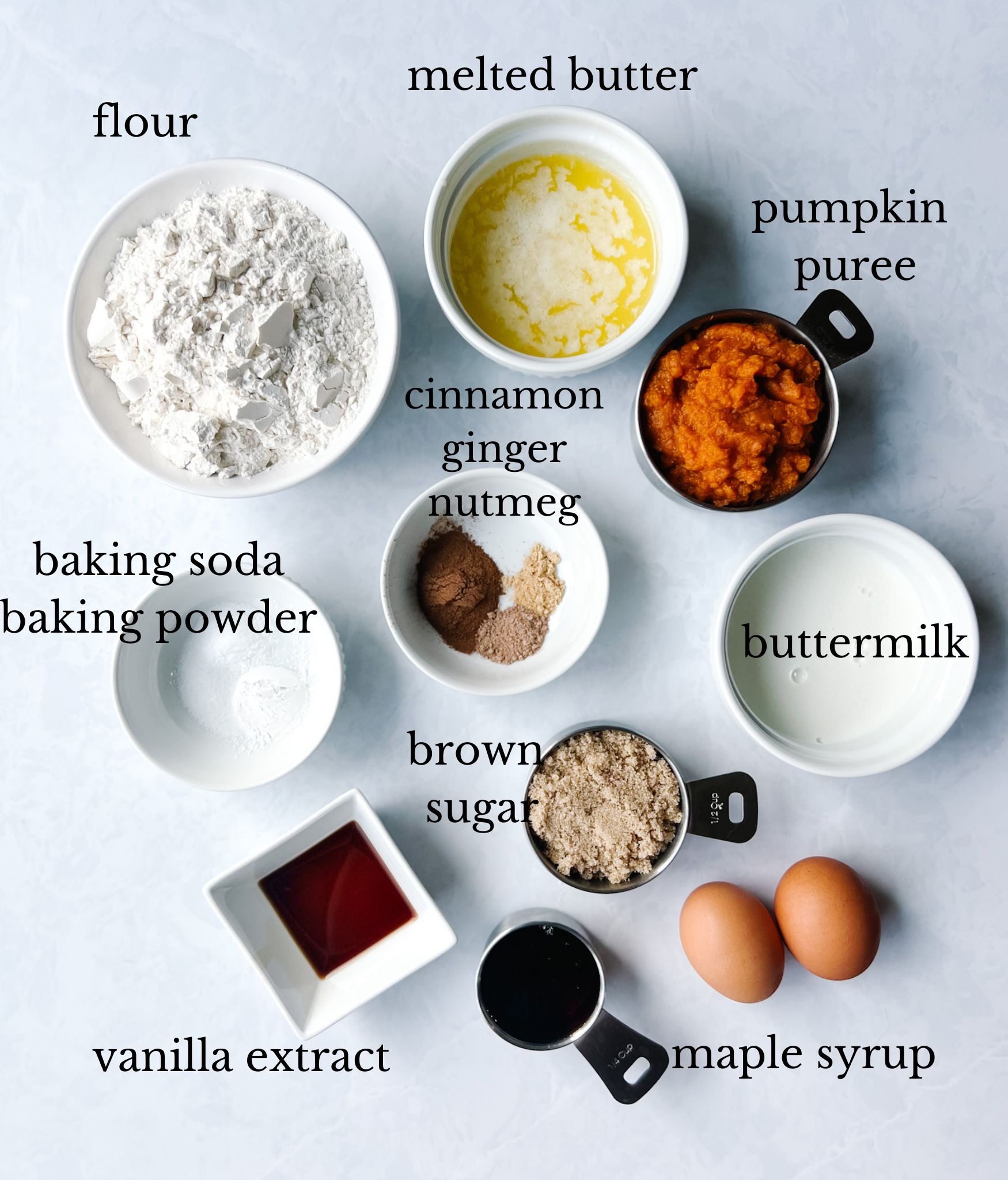 ingredients for baked pumpkin doughnuts with maple glaze