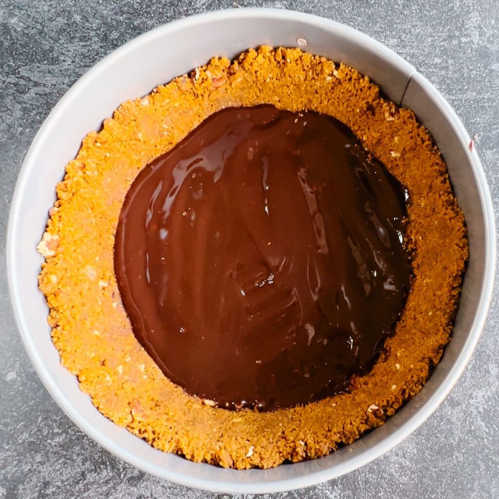 Turtle Crust Turtle Cheesecake with Biscoff Cookie Crust - Bake With Jamie
