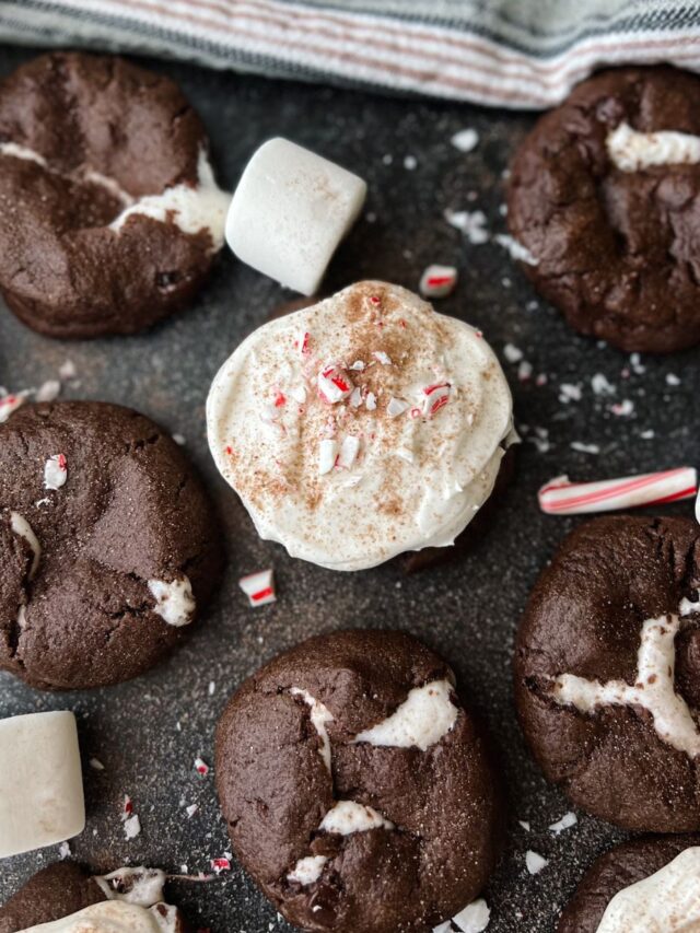 Hot Cocoa Cookies with Whipped Cream Frosting and Crushed Peppermint