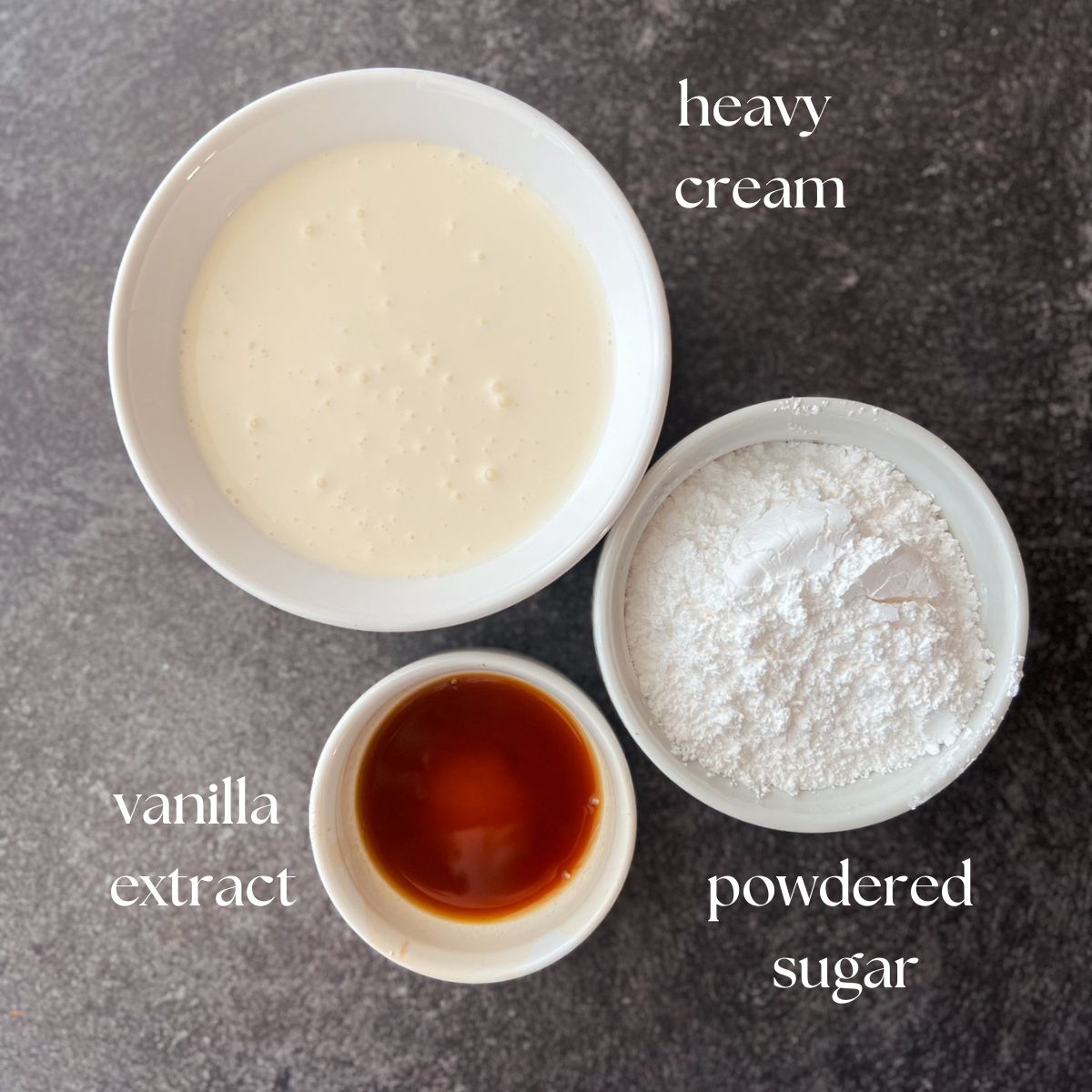 Ingredients for whipped cream frosting: heavy cream, powdered sugar, and vanilla extract.