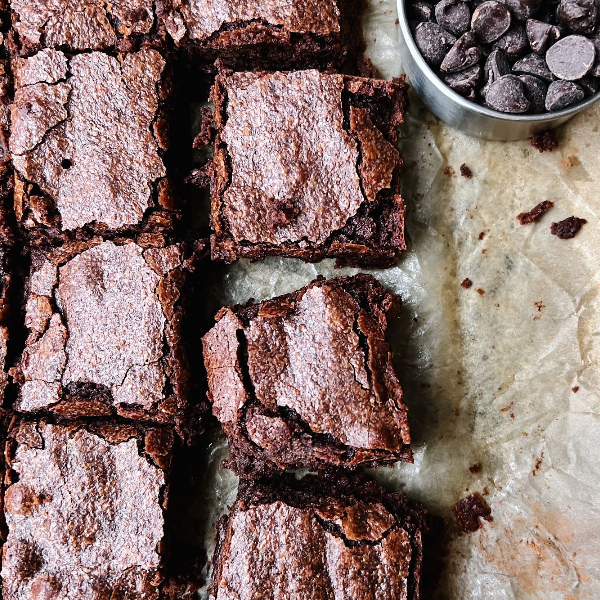 Sourdough discard brownies on parchment paper.