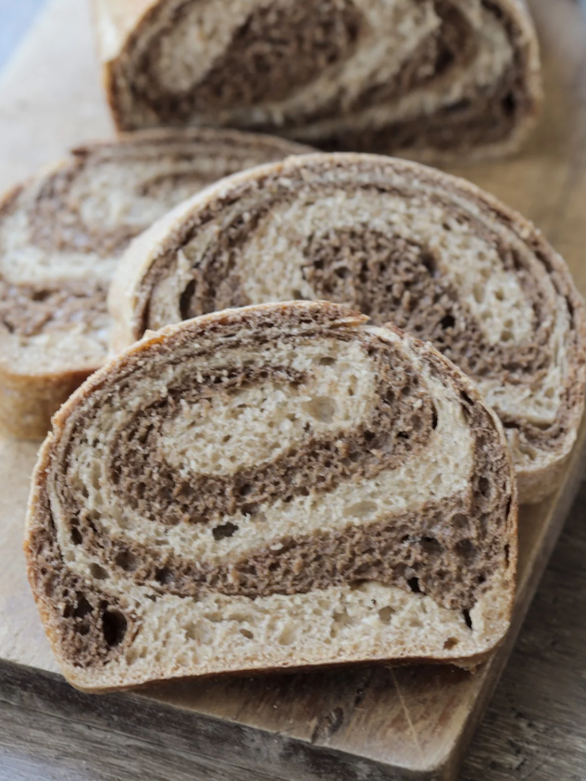 A closeup of the swirled marble rye bread is shown.