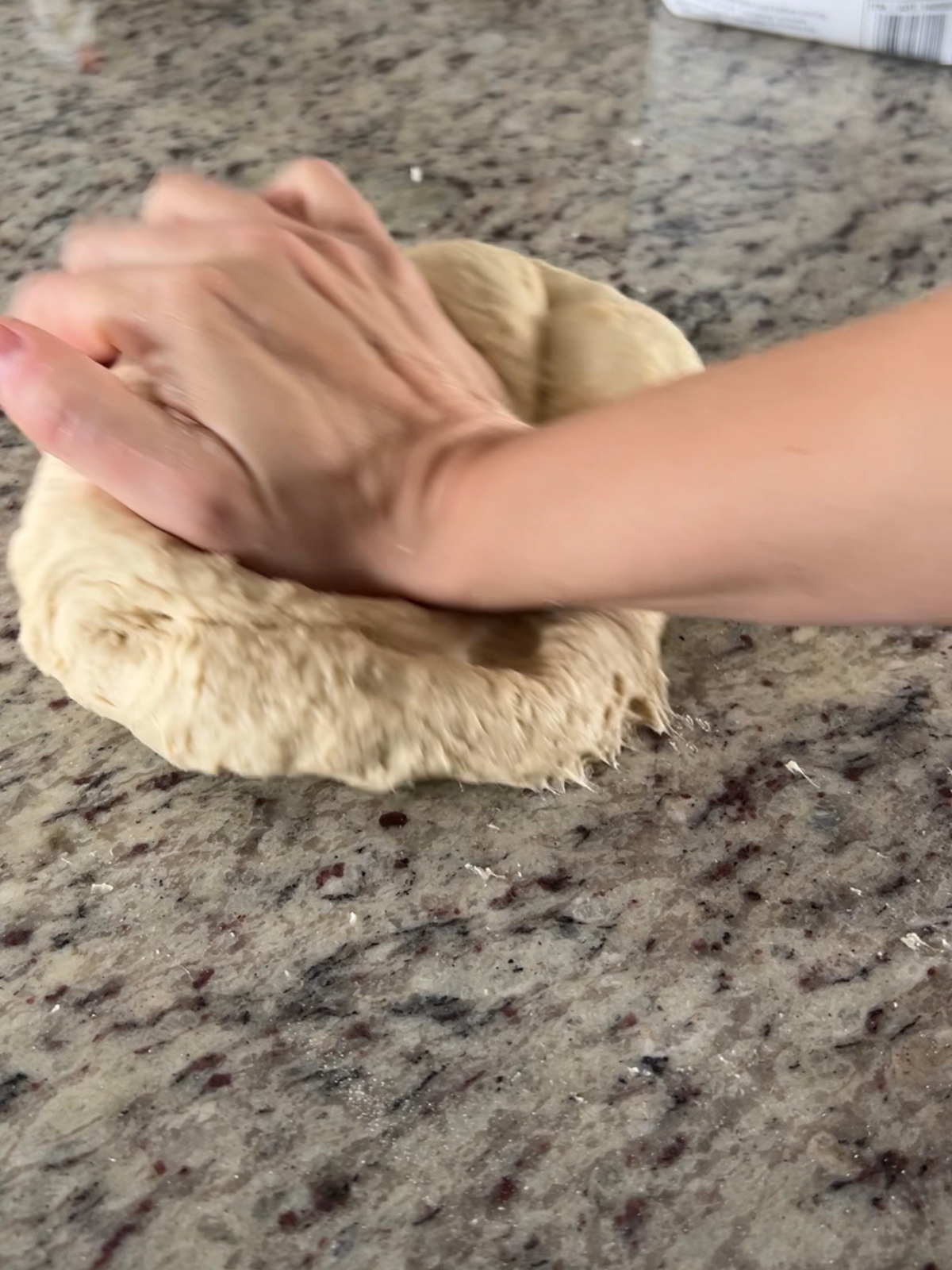 Here I'm showing how I knead the sourdough bagel dough with my hands.