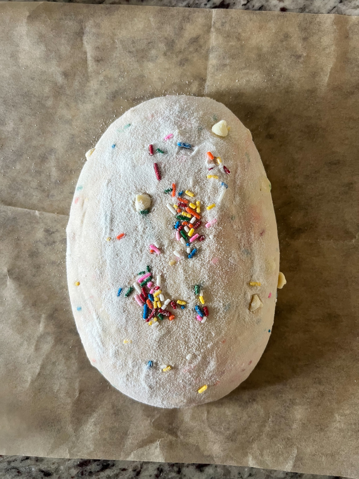The funfetti sourdough bread dough after overnight cold ferment about to be scored and baked.