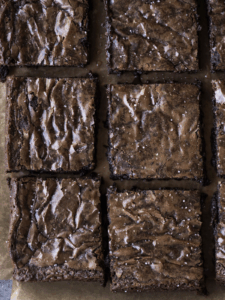 Six brown butter brownie squares.