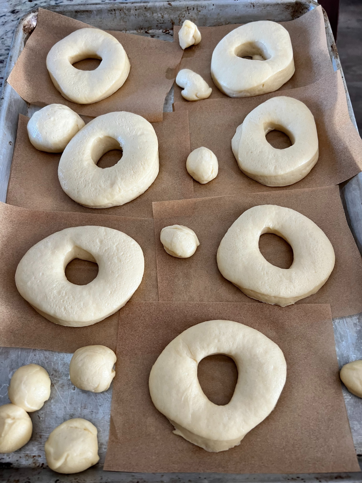 The sourdough donuts are shown after having risen for a few hours.