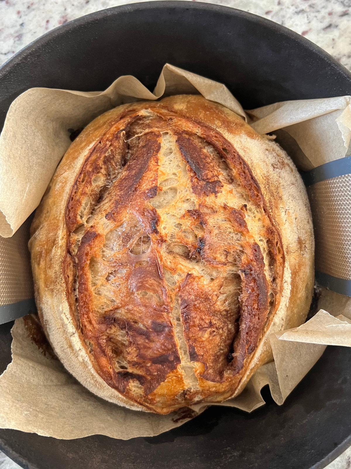 The sourdough cinnamon brown sugar loaf is shown after an additional 15 minutes uncovered.