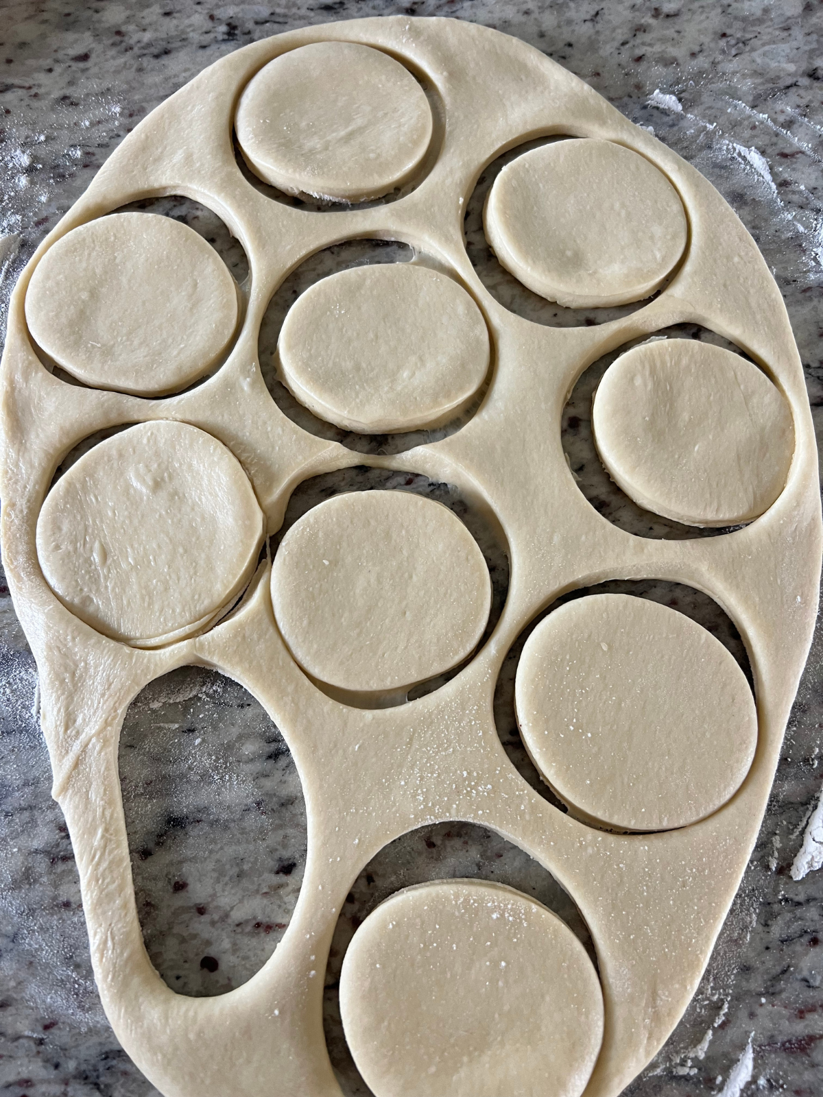 The sourdough brioche dough has been rolled out and cut.