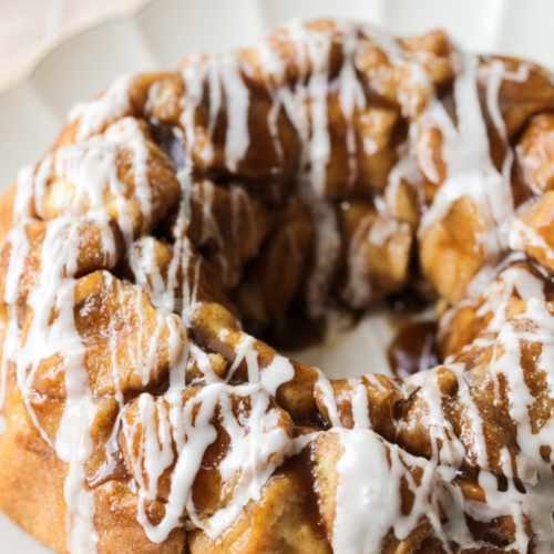 A side profile of the sourdough monkey bread with vanilla icing.