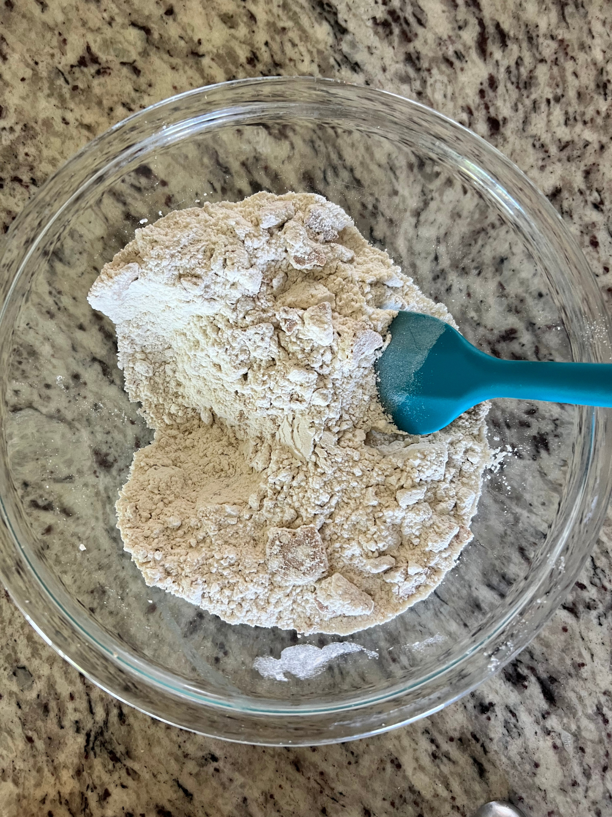 Sourdough s'mores cookie bars dry ingredients sit in a glass mixing bowl.