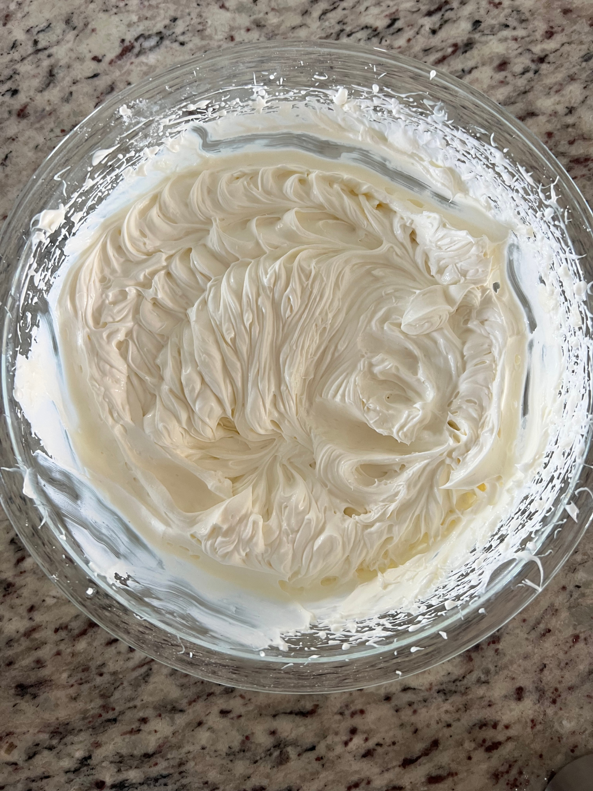 The cream cheese whipped topping is shown in a mixing bowl.
