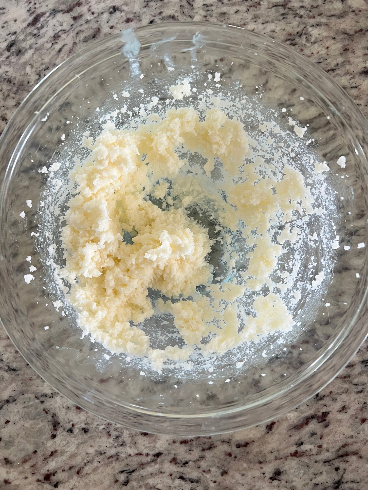 The butter and sugar have been creamed to prepare for the remaining wet ingredients for the sourdough vanilla pound cake batter.