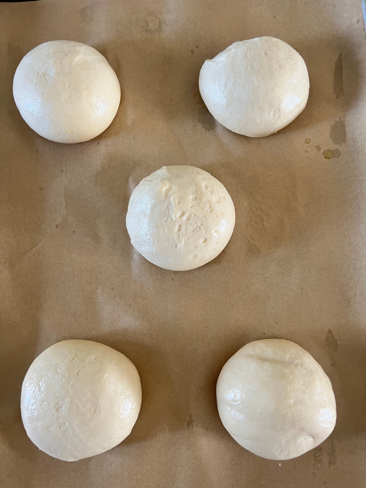 The sourdough brioche kolache dough balls have been appropriately fermented and are ready to be filled.