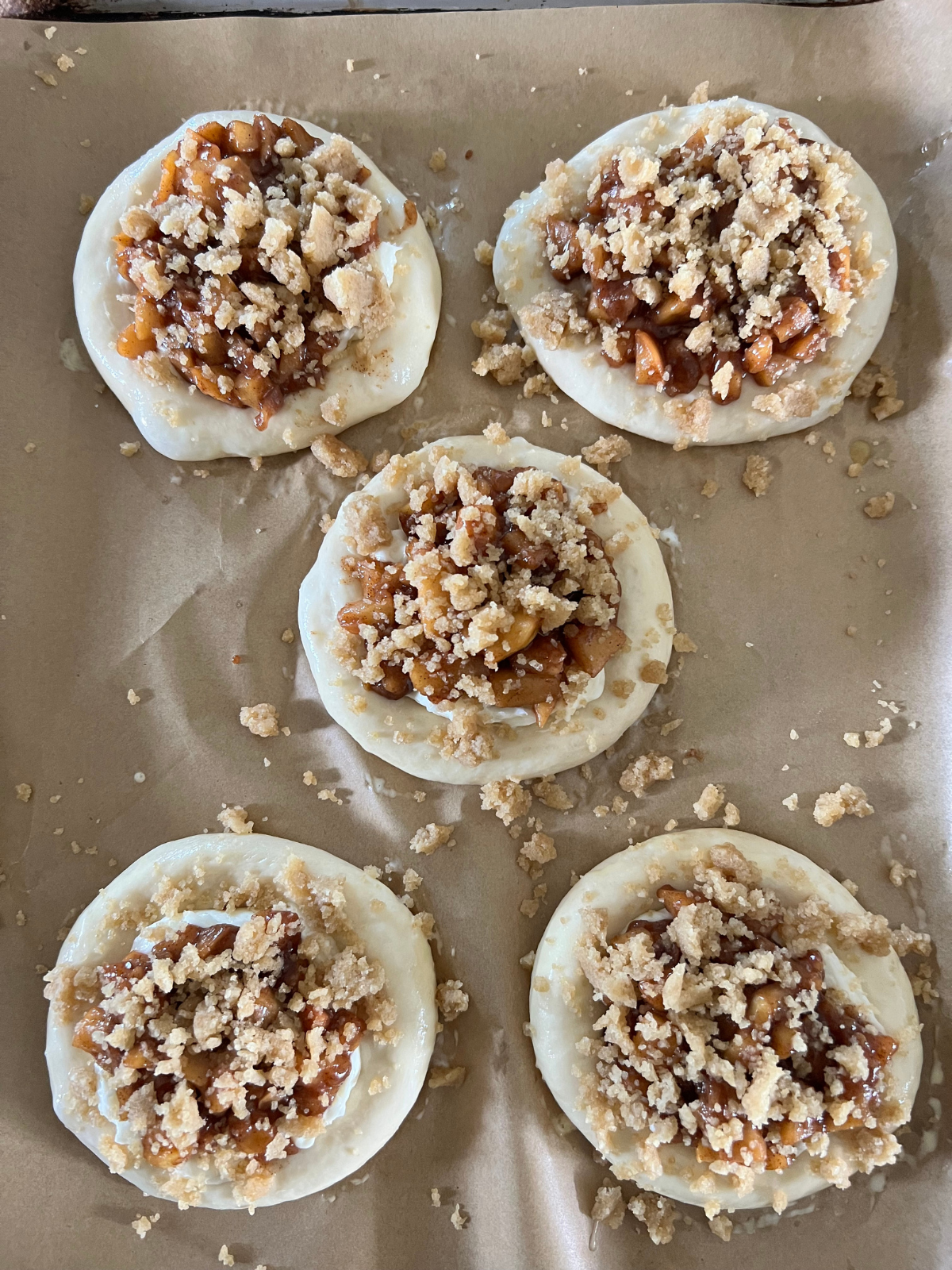 The kolaches are shown with all the filling before they are baked.