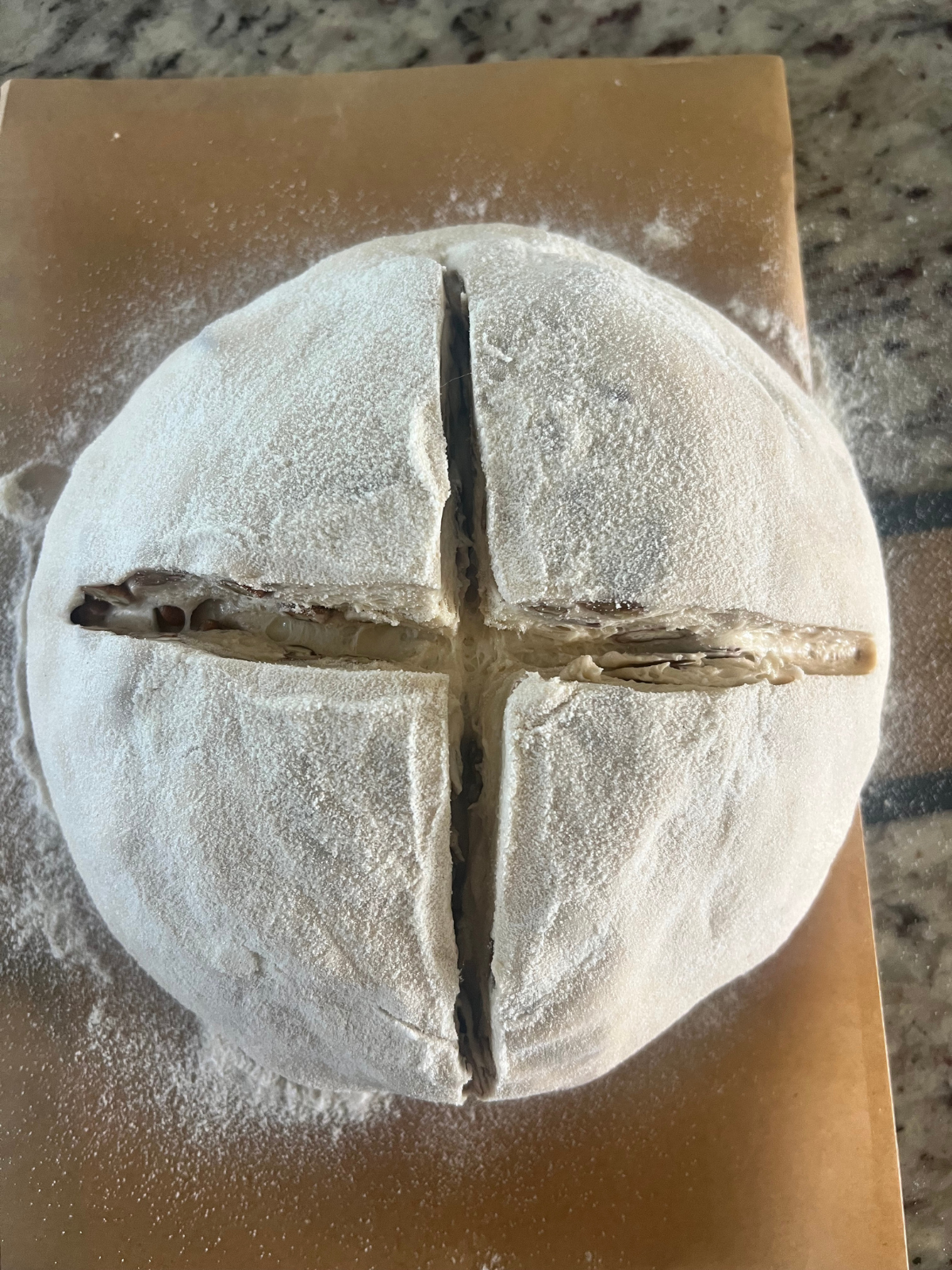 The dough has been scored after an overnight cold ferment.
