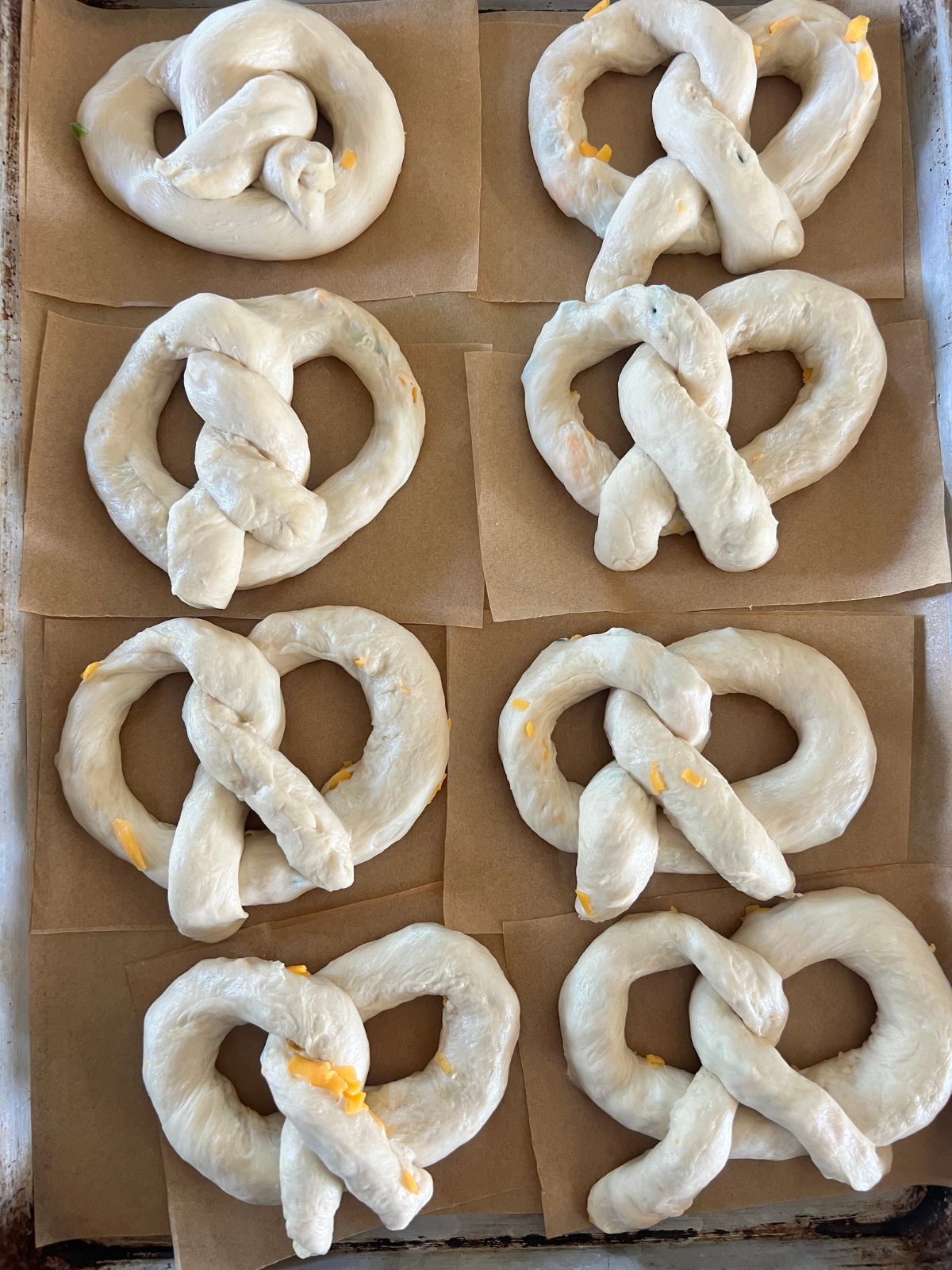 The sourdough pretzels are shown after their second rise.